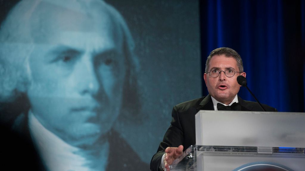 FILE - An image of former President James Madison is seen behind Leonard Leo, as he speaks at the National Lawyers Convention in Washington, in this Nov. 16, 2017 file photo. (AP Photo/Sait Serkan Gurbuz, file)