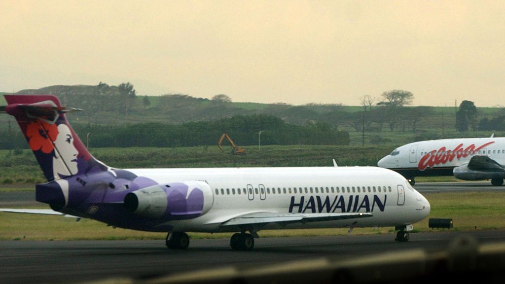 An Hawaiian Airlines plane taxis at Kahalui, Hawaii, on the island of Maui, March 24, 2005. (AP Photo/Lucy Pemoni, File)