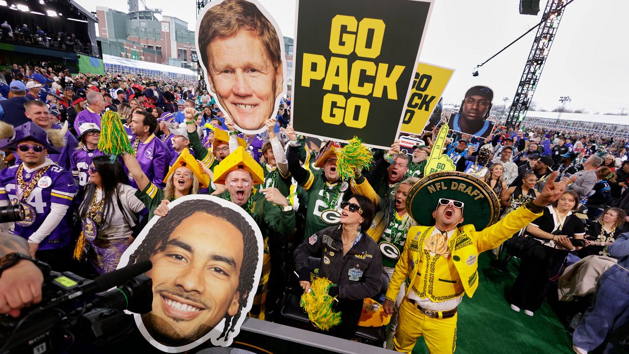 Green Bay Packers fans cheer before the first round of the NFL football draft, Thursday, April 24, 2025, in Green Bay, Wis.