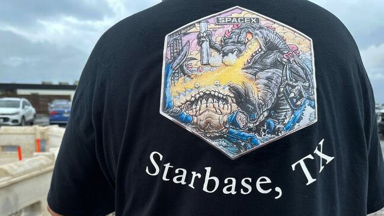 A man with Proposed new name for the town on his T-shirt is seen in Boca Chica, Texas, that would become Starbase, Texas, if local residents approve a measure to make the area surrounding the rocket launch site its own city. (AP Photo/Valerie Gonzalez)