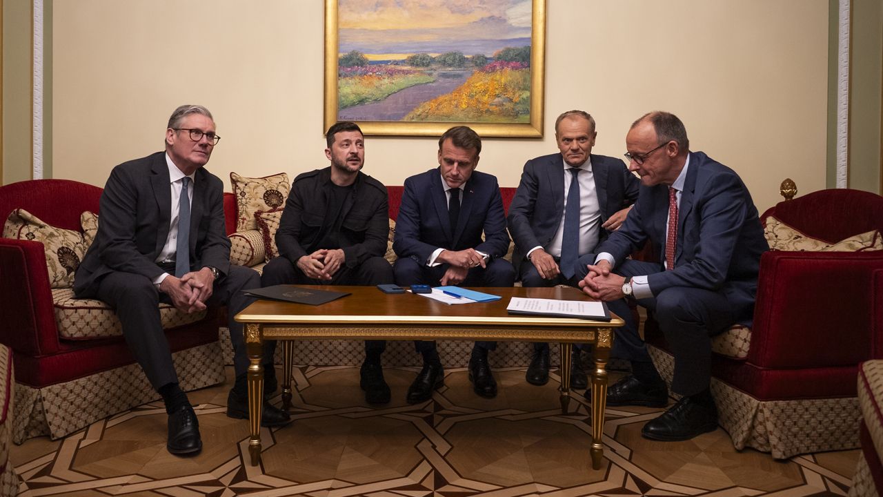 From left, British Prime Minister Keir Starmer, Ukrainian President Volodymyr Zelenskyy, French President Emmanuel Macron, Polish Prime Minister Donald Tusk and German Chancellor Friedrich Merz make a call to U.S. President Donald Trump from Kyiv, Ukraine, on Saturday, May 10, 2025. (AP Photo/Mstyslav Chernov)