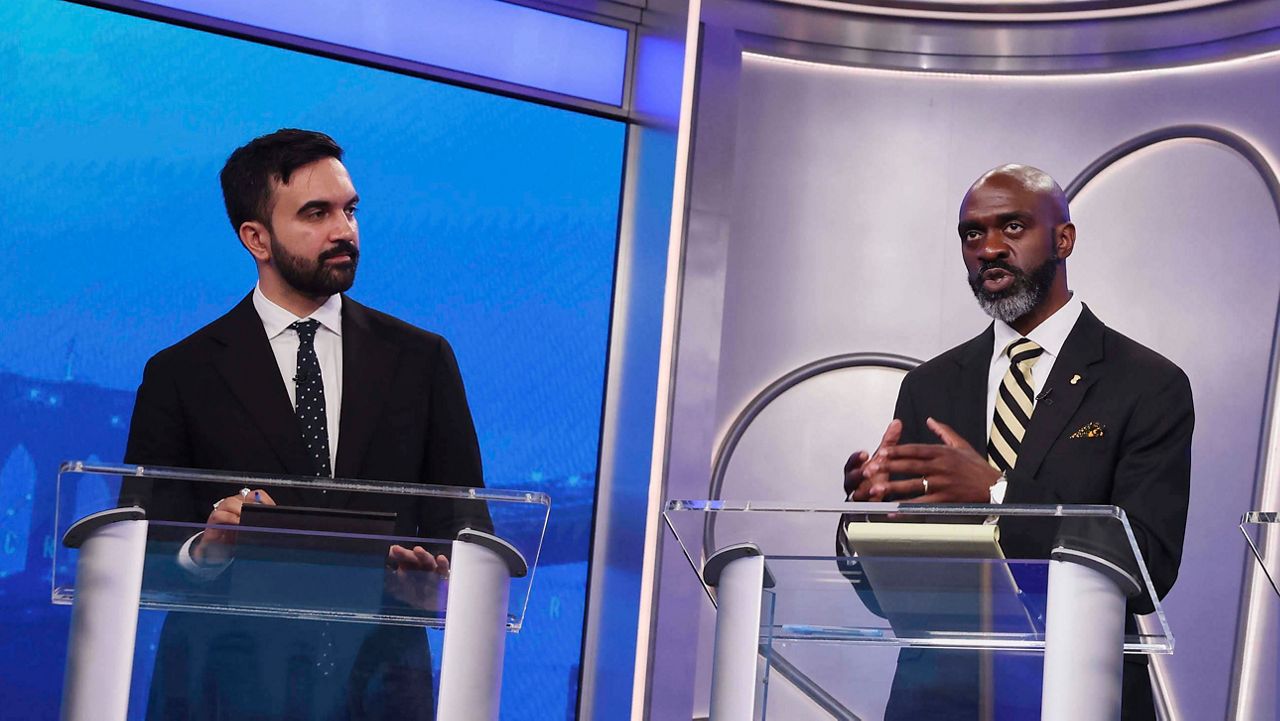 Democratic mayoral candidate Michael Blake, right, speaks as Zohran Mamdani looks on during a Democratic mayoral primary debate on June 4, 2025. (AP Photo/Yuki Iwamura, Pool)