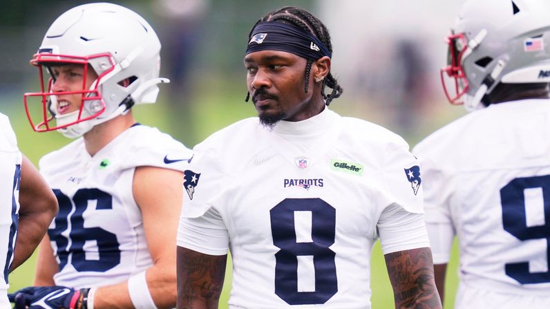 New England Patriots wide receiver Stefon Diggs (8) stands with teammates during an NFL football practice, Monday, June 9, 2025, in Foxborough, Mass. (AP Photo/Charles Krupa)