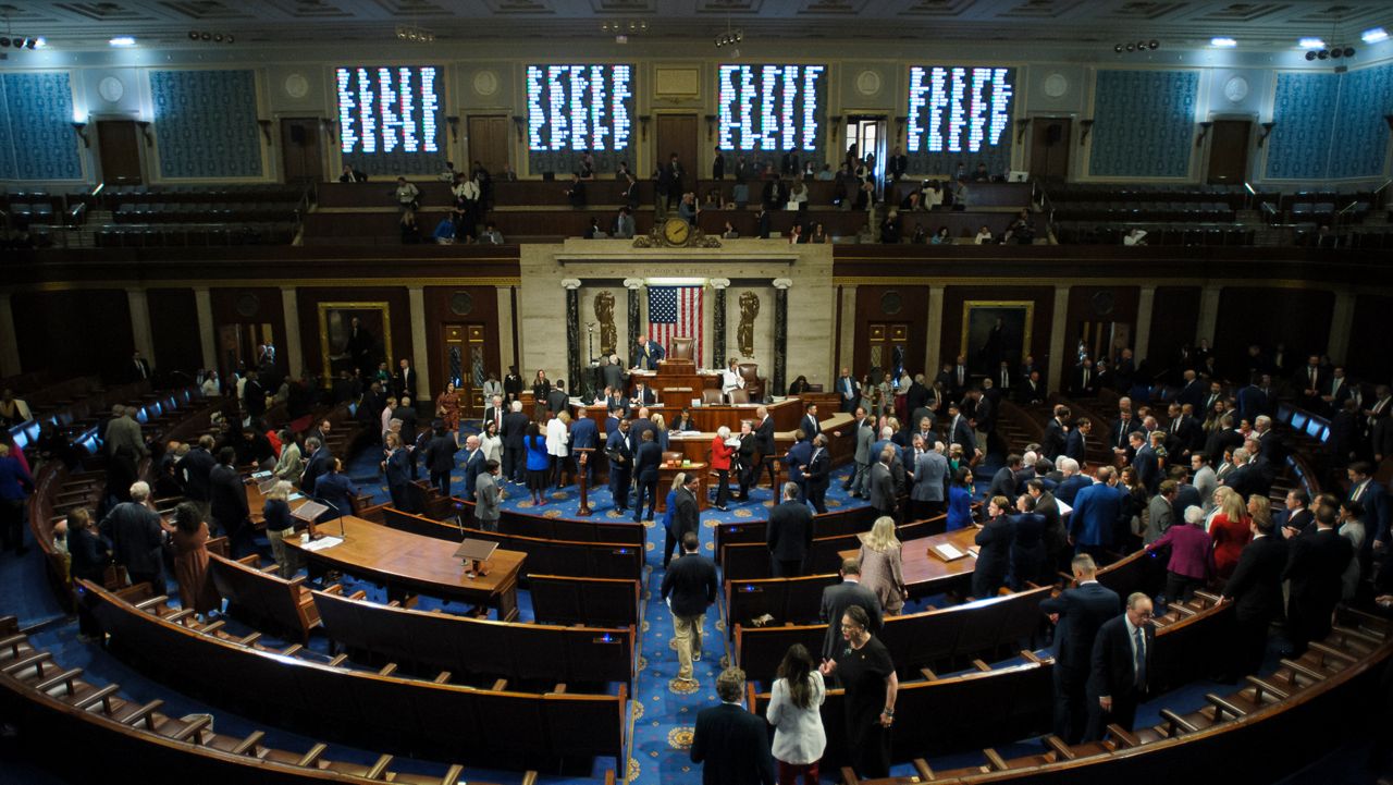 Democrats and Republicans vote in the House chamber during final passage of President Donald Trump's signature bill of tax breaks and spending cuts, at the Capitol, Thursday, July 3, 2025, in Washington. (AP Photo/Rod Lamkey, Jr.)