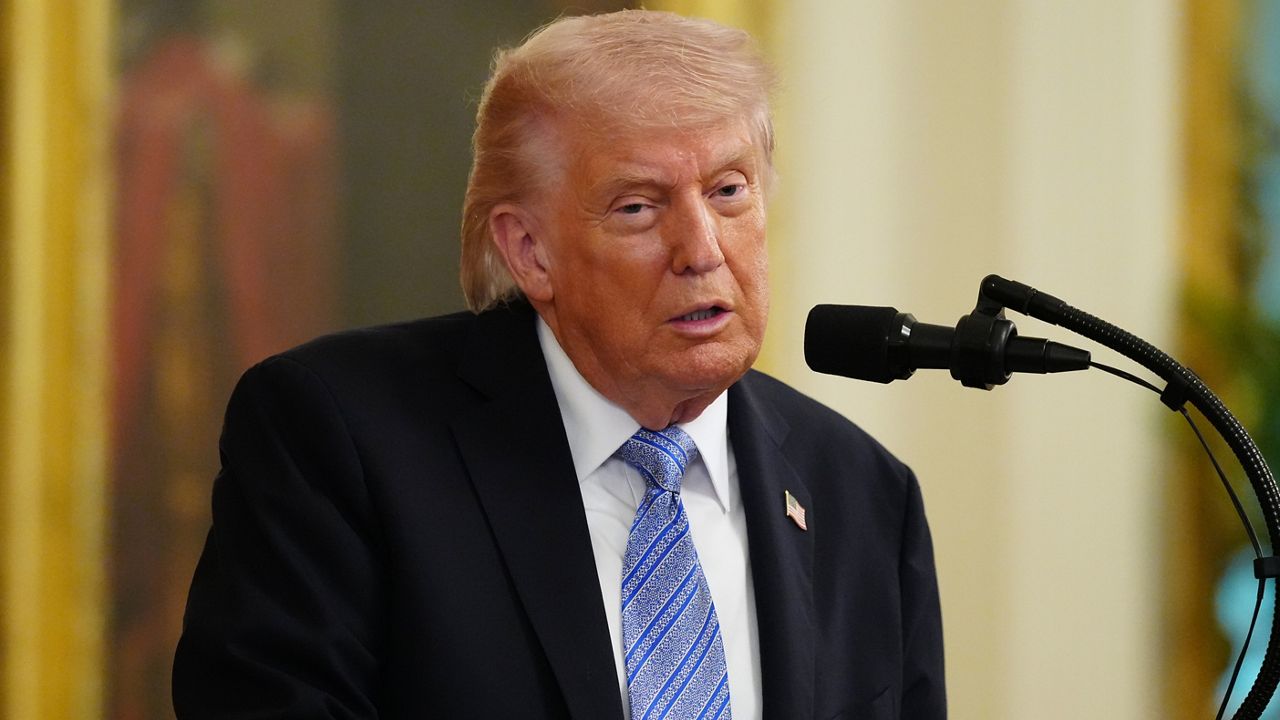 Trump says 'country is booming' despite 'mini war' as he lauds his economic leadership at a small business summit ahead of midterms