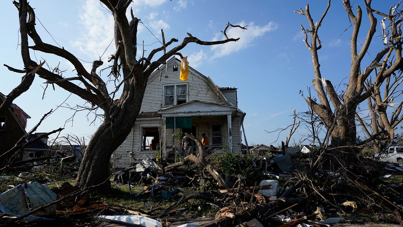 The tornado damaged their own homes, but Menasha police officers still on patrol