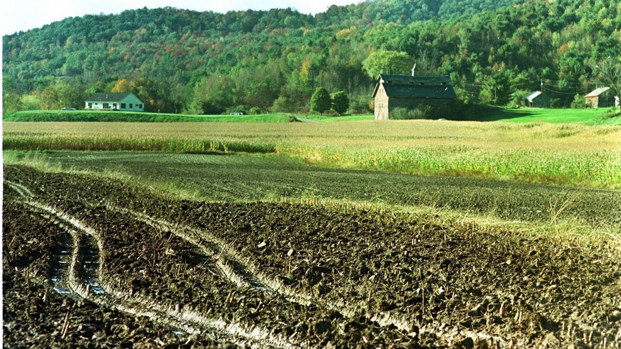 These fields and an historic barn , seen on Tuesday, Oct. 6, 1998, along Route 2 in Richmond, Vt. are part of a 1000-acre parcel of land to be saved by the Richmond Land Trust. The trust hopes to restore the barn and keep the land in sustainable agriculture as part of a vibrant agricultural center. (AP Photo/Toby Talbot)