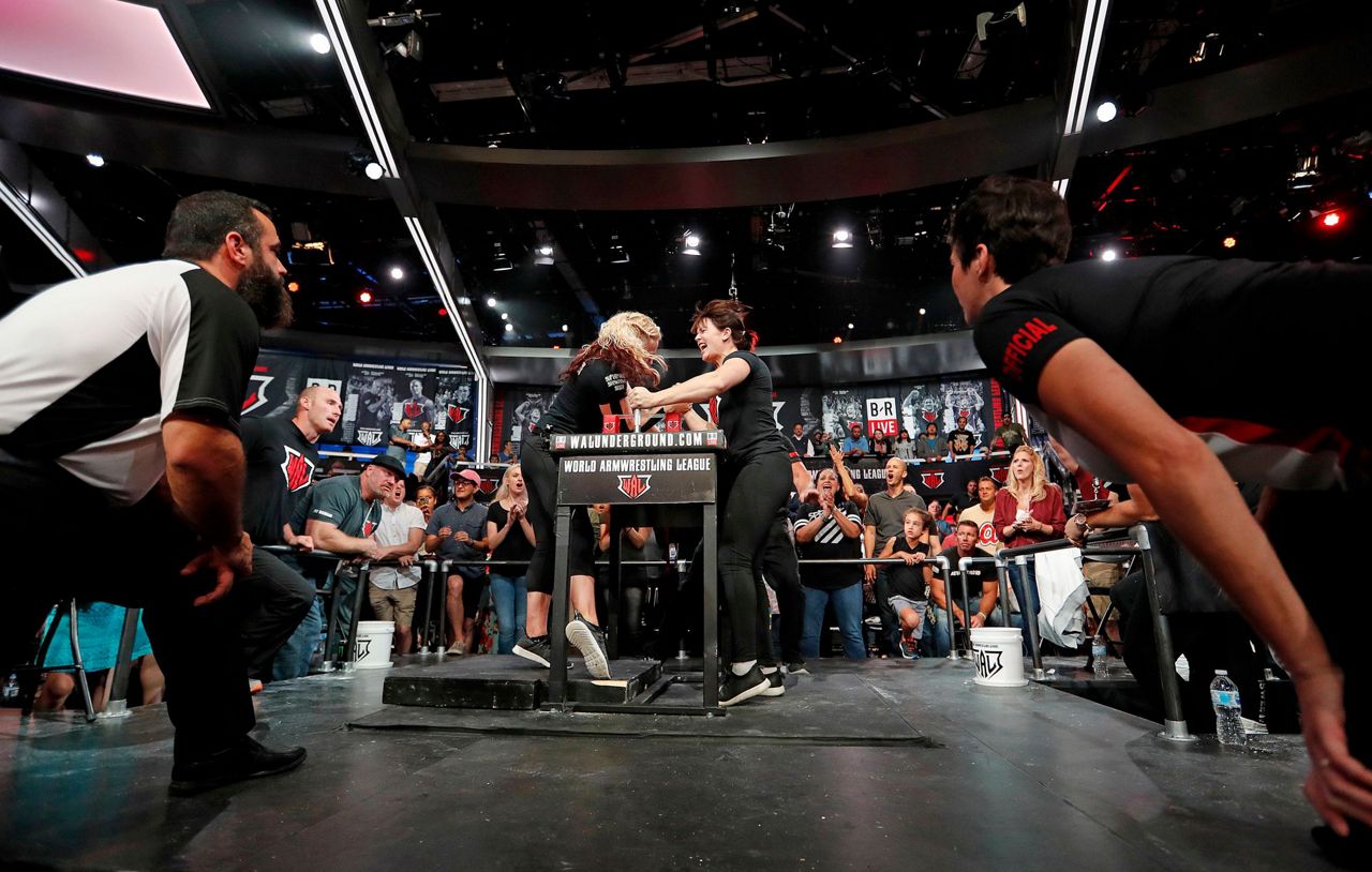 Arm wrestling looks to climb beyond barroom bragging rights
