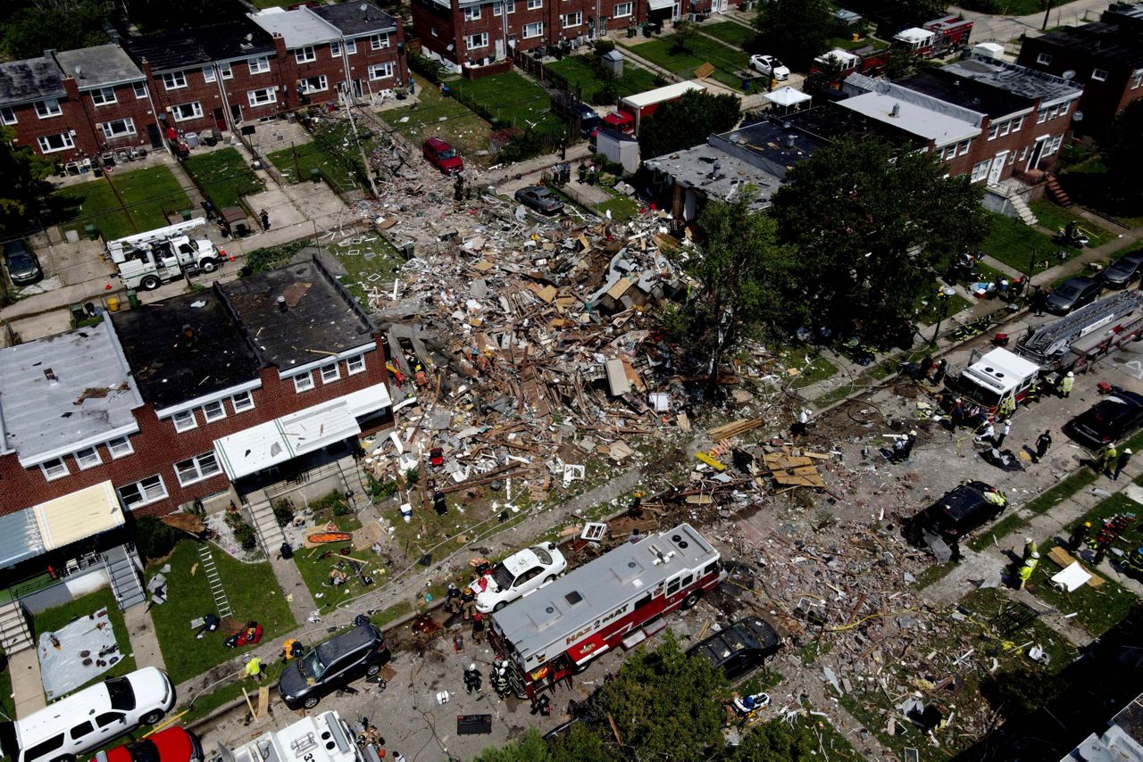 Explosion levels Baltimore homes; 1 dead, 1 trapped