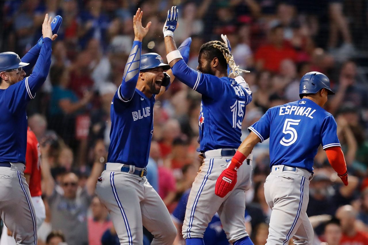 Blue Jays' Tapia hits insidethepark grand slam vs Red Sox