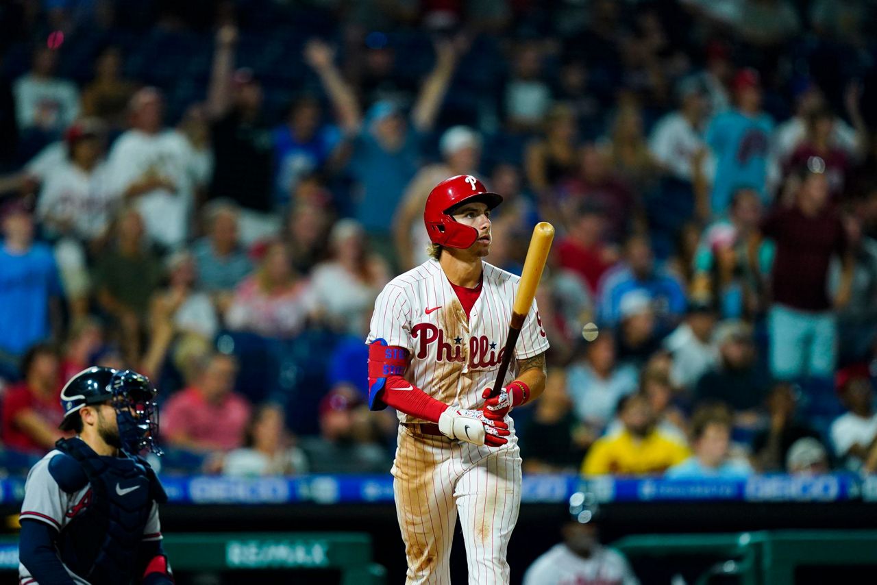 Philadelphia Phillies' Matt Vierling, left, celebrates with Alec