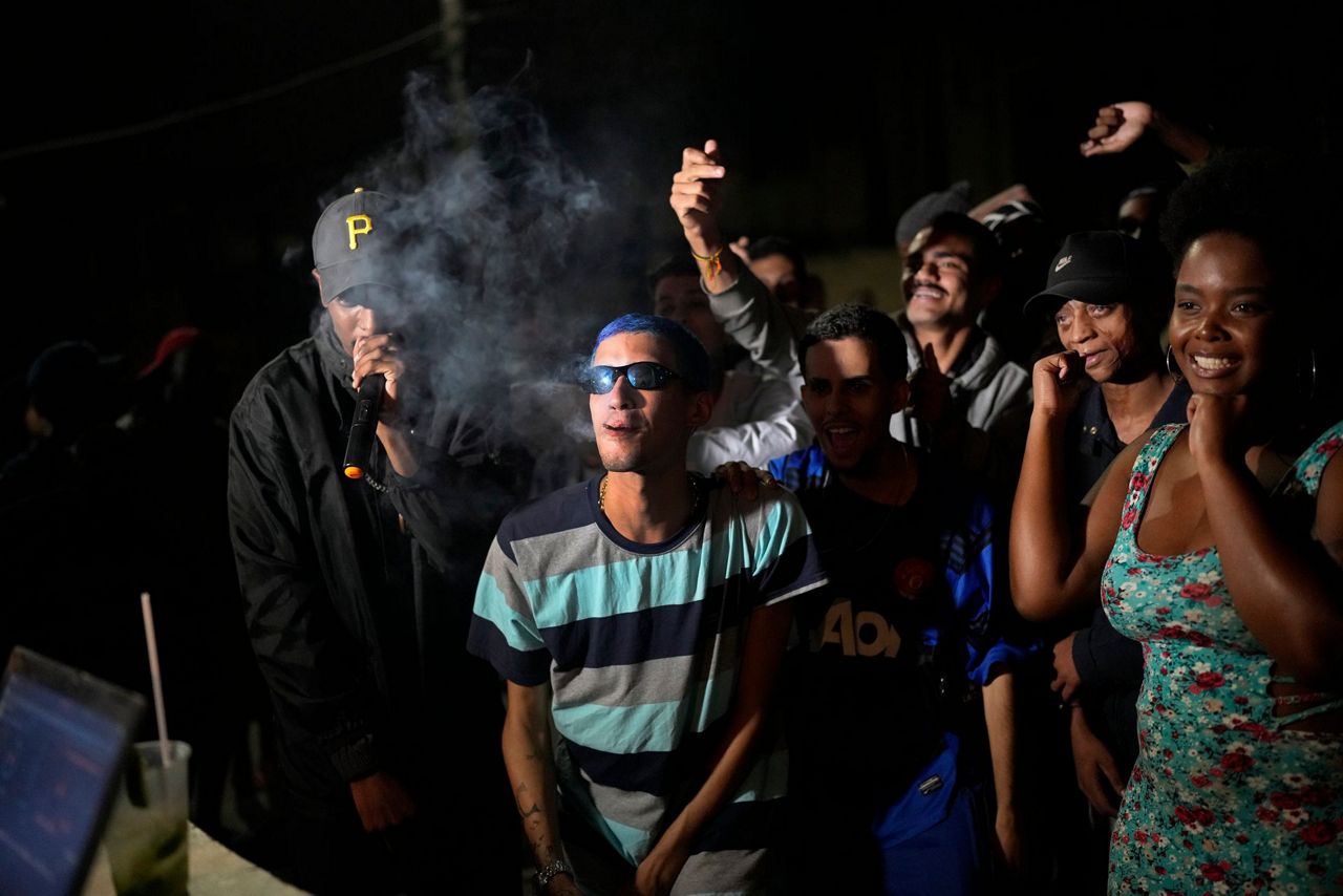 In Brazil favela, rap battle is sign of returning normality