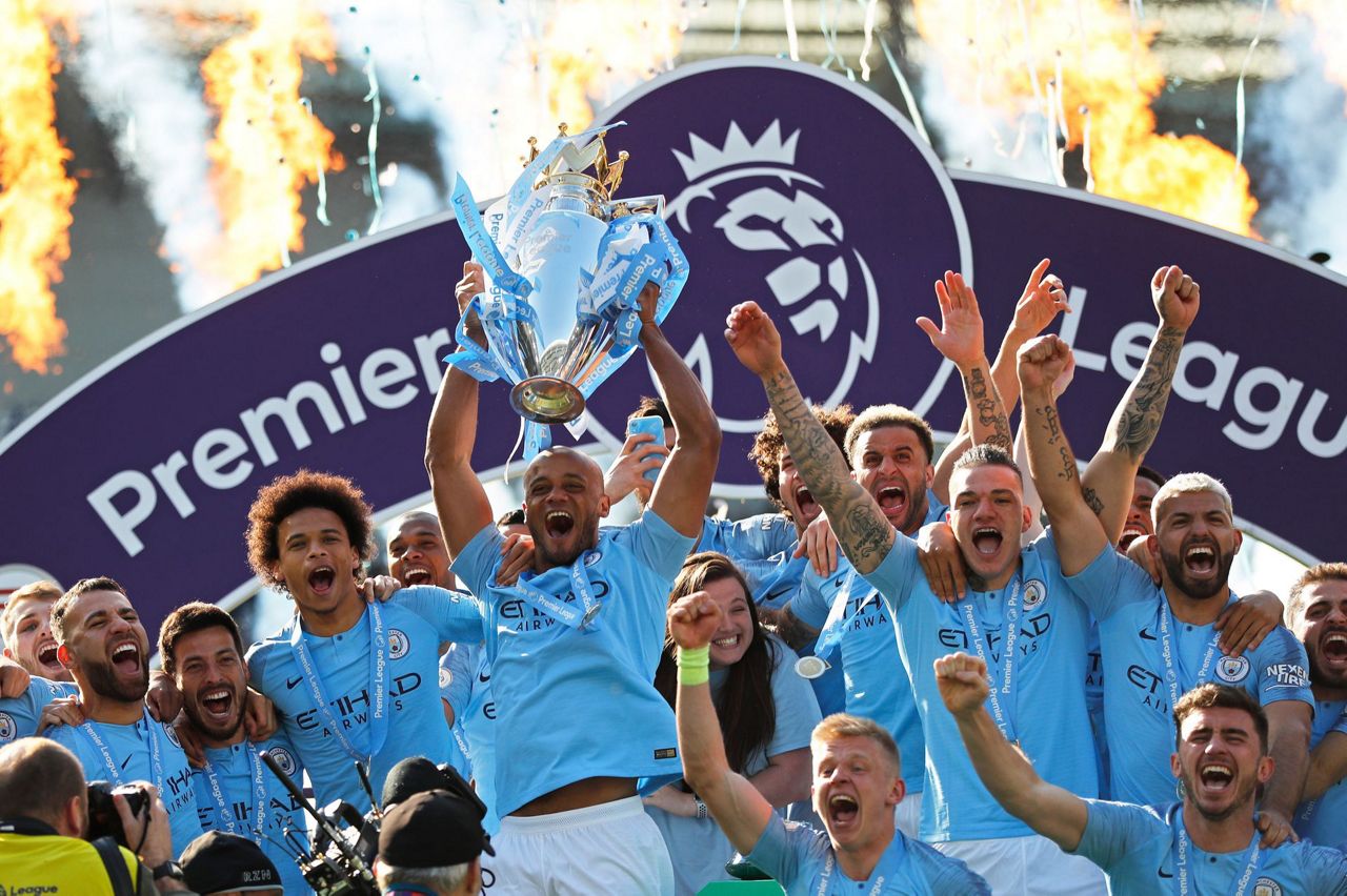 Man City retains Premier League title on final day of season