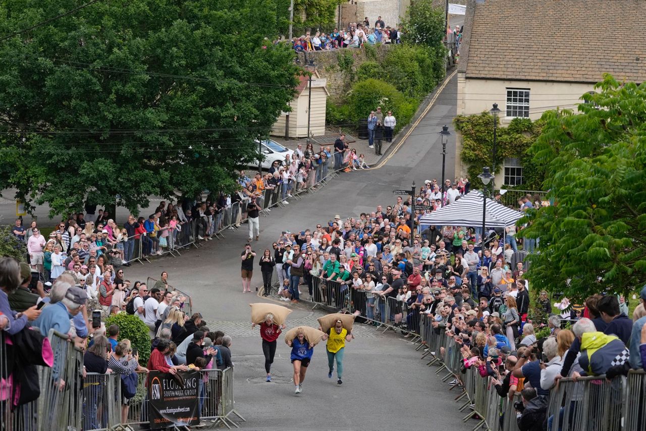 Chasing cheese wheels or lugging sacks of wool, UK competitors embrace ...