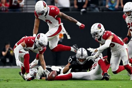 Las Vegas Raiders linebacker Jayon Brown (50) celebrates during the first  half of an NFL football game against the Arizona Cardinals Sunday, Sept.  18, 2022, in Las Vegas. (AP Photo/John Locher Stock