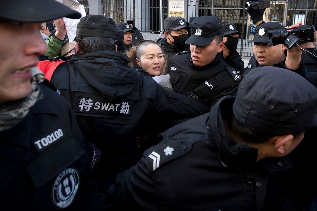 Wife of Chinese human rights lawyer protests his treatment