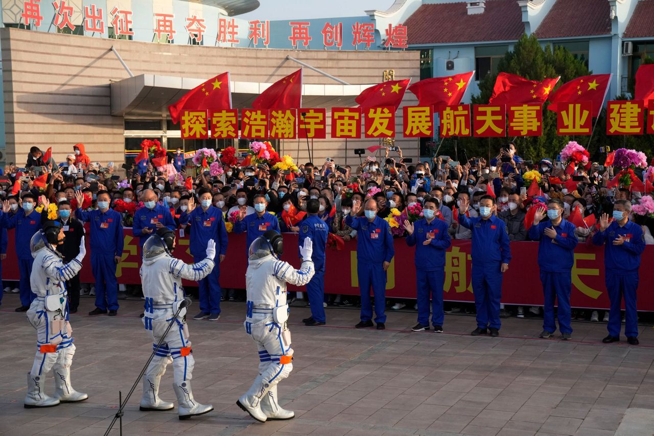 China launches new crew for space station, with eye to putting ...