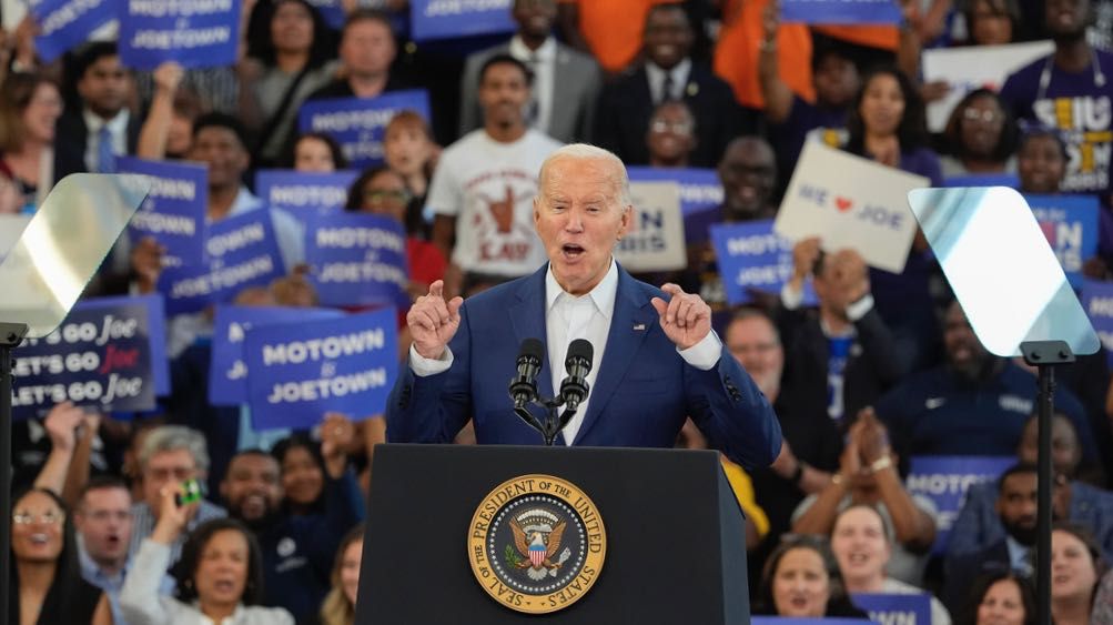 President Joe Biden gestures while speaking to supporters at a campaign event at Renaissance High School in Detroit, Friday, July 12, 2024, in Detroit. (AP Photo/Carlos Osorio)