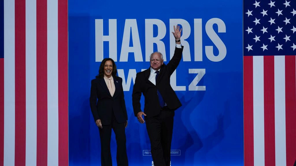 Democratic presidential nominee Vice President Kamala Harris and her running mate Minnesota Gov. Tim Walz arrive at a campaign rally in Philadelphia, Tuesday, Aug. 6, 2024. (AP Photo/Matt Rourke)