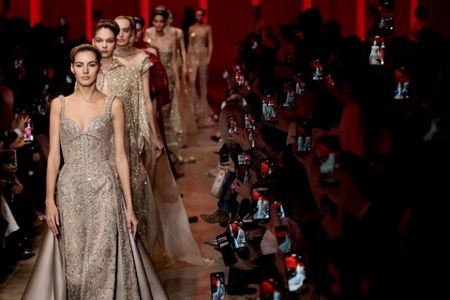 Jennifer Lopez shimmies, and Elie Saab shimmers, at the Paris spring couture  shows