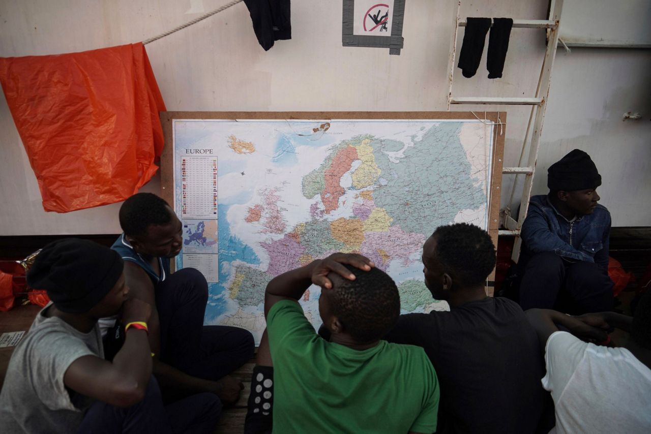 Sicilian fishermen risk prison to rescue migrants: 'No human would turn  away', Italy