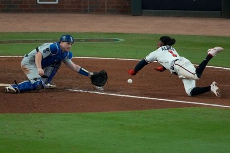 Eddie Rosario, Braves sneak by Dodgers to take 2–0 series lead in NLCS -  Sports Illustrated