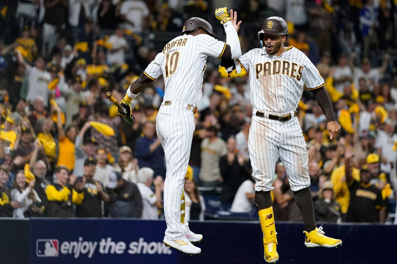 Nick Martinez and Austin Nola of the San Diego Padres celebrate a