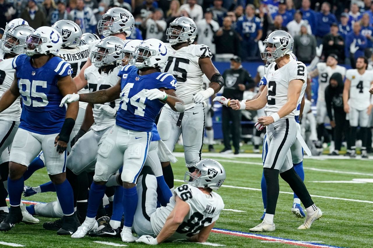 Las Vegas Raiders place kicker Daniel Carlson (2) after kicking field goal  during an NFL football game against the Seattle Seahawks, Sunday, Nov. 27,  2022, in Seattle, WA. The Raiders defeated the