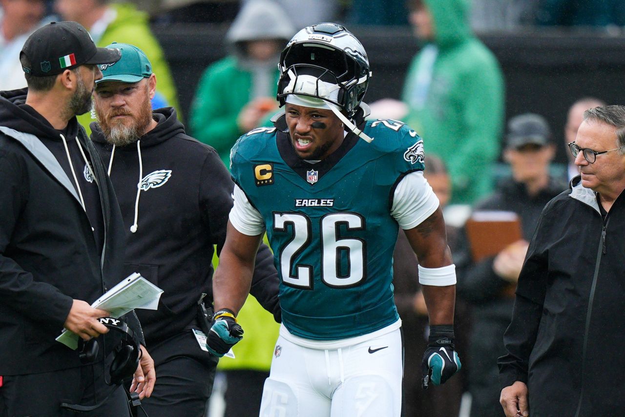 Eagles running back Saquon Barkley leaves game against Rams with ...