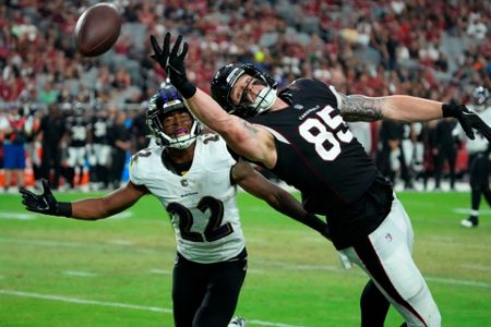 Baltimore Ravens safety Kyle Hamilton (14) lines up against the Arizona  Cardinals during the first half of an NFL preseason football game, Sunday,  Aug. 21, 2022, in Glendale, Ariz. (AP Photo/Rick Scuteri