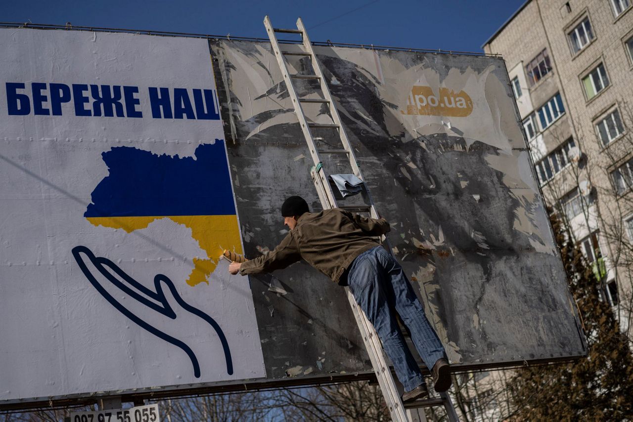 Patriotic tattoos, billboards popular in Ukraine