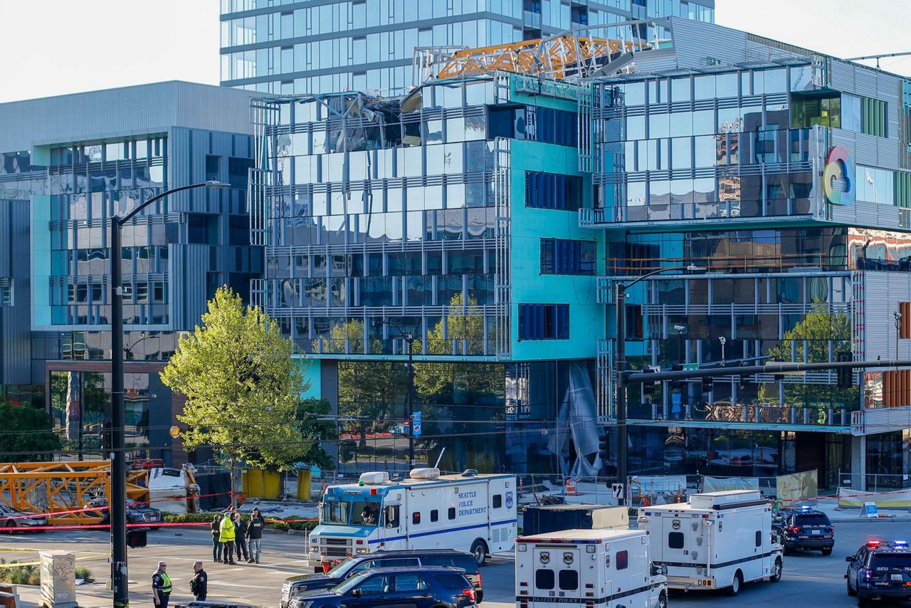 Crane collapses in downtown Seattle on Saturday