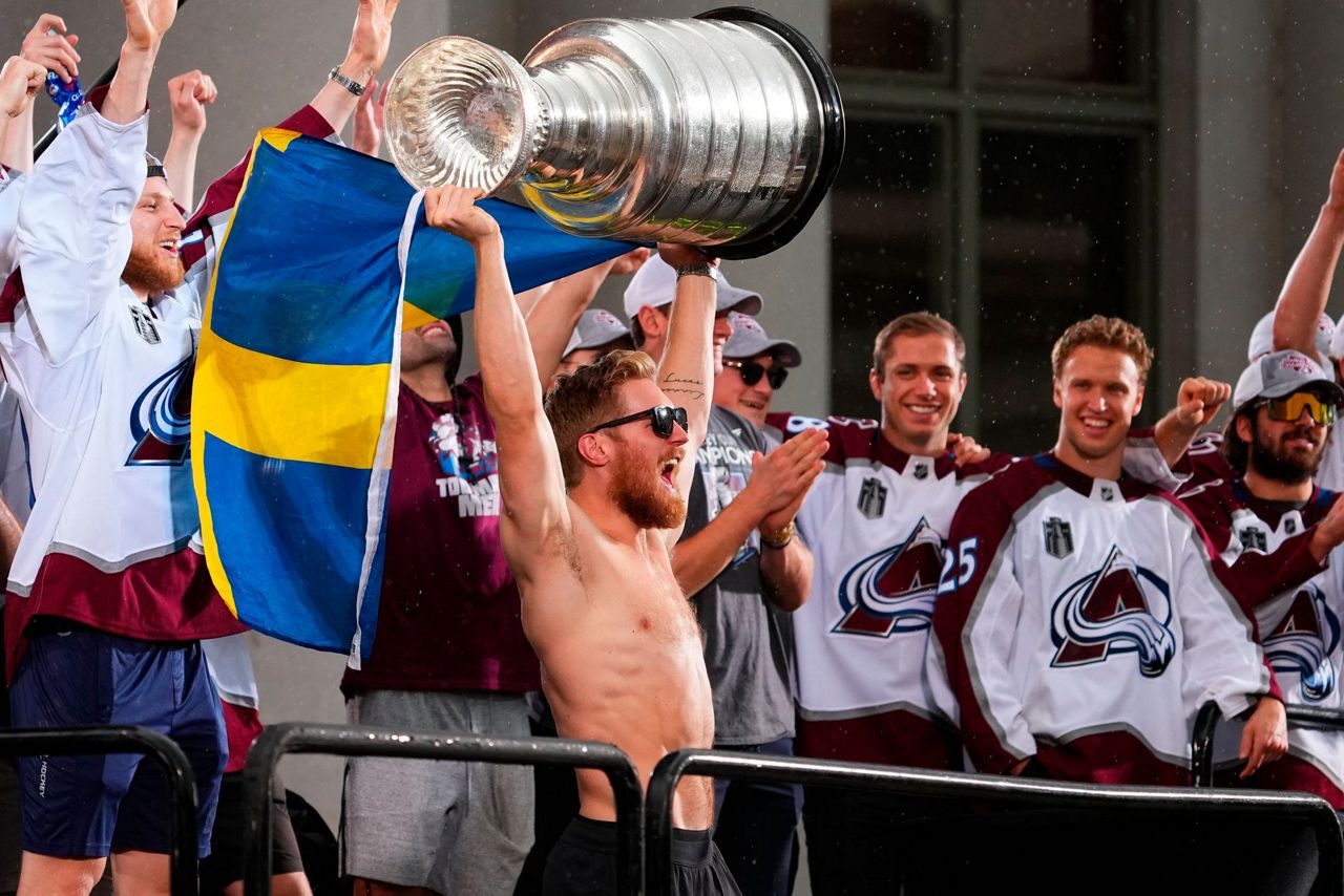 Parade of champs: Avs live it up as they celebrate Cup title