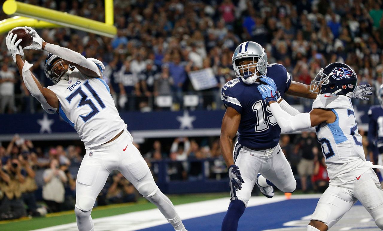 Titans top Cowboys 28-14 in Amari Cooper's Dallas debut