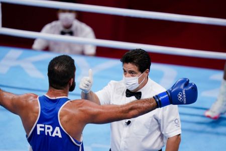 Mourad Aliev of Team France reacts after losing by