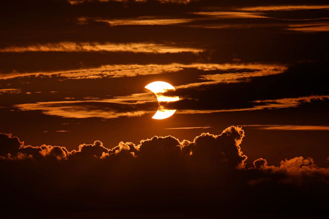 Sunrise special Solar eclipse thrills world's northern tier