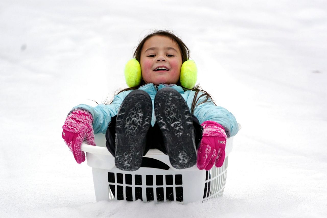 The Latest Some US cities record coldest weather in decades