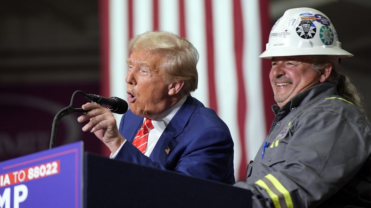 Republican presidential nominee former President Donald Trump brings Mark Caskey to speak at a campaign event, Friday, Aug. 30, 2024, in Johnstown, Pa. (AP Photo/Alex Brandon)