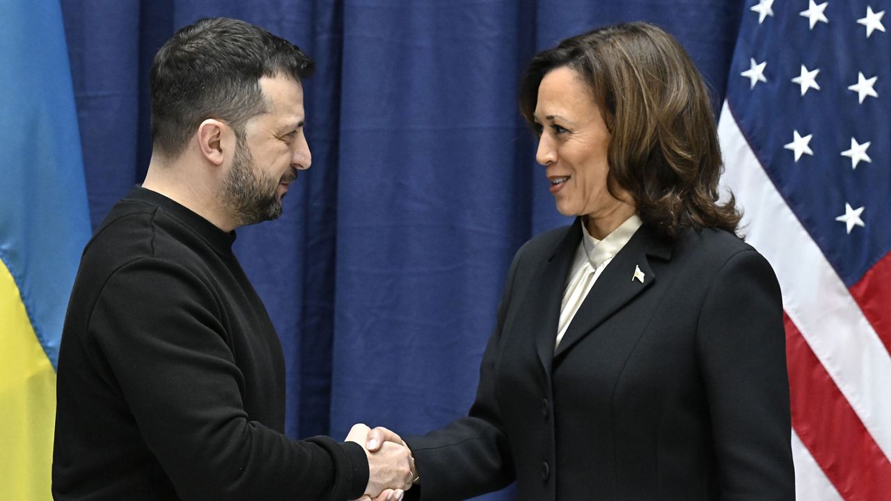 Ukrainian President Volodymyr Zelenskyy, left, and U.S. Vice President Kamala Harris shake hands at the end of a joint press conference at the Munich Security Conference (MSC) in Munich, Germany, Saturday Feb. 17, 2024. (Tobias Schwarz/Pool via AP)