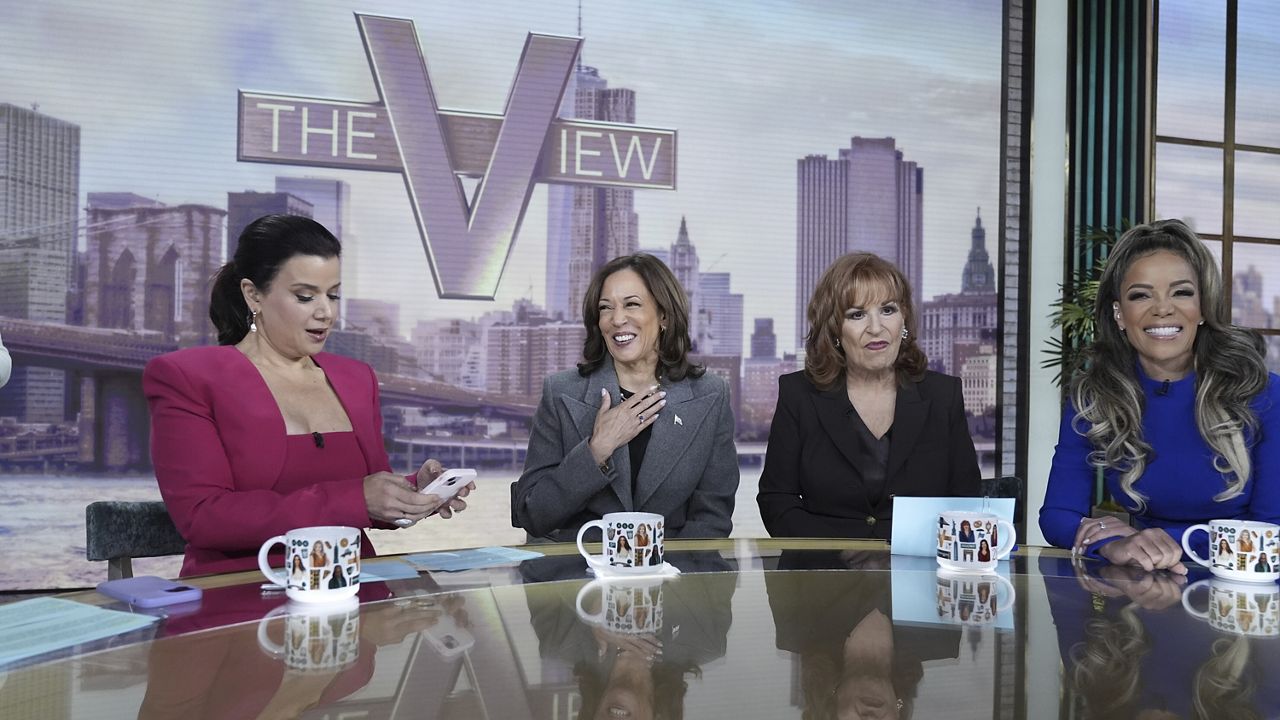 Democratic presidential nominee Vice President Kamala Harris chats with the hosts during a commercial break at The View, Tuesday, Oct. 8, 2024, in New York. From left are Ana Navarro, Harris, Joy Behar and Sunny Hostin. (AP Photo/Jacquelyn Martin)