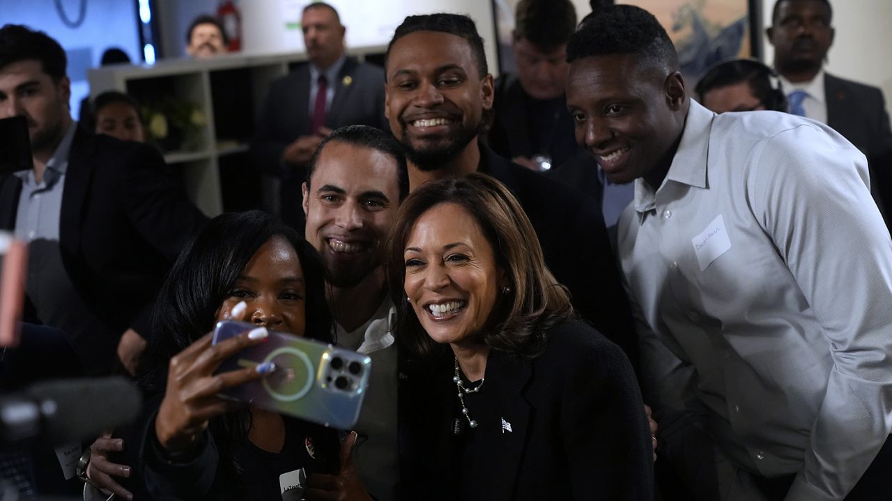 Democratic presidential nominee Vice President Kamala Harris poses for a photo as she visits Norwest Gallery of Art in Detroit, Tuesday, Oct. 15, 2024. (AP Photo/Jacquelyn Martin)