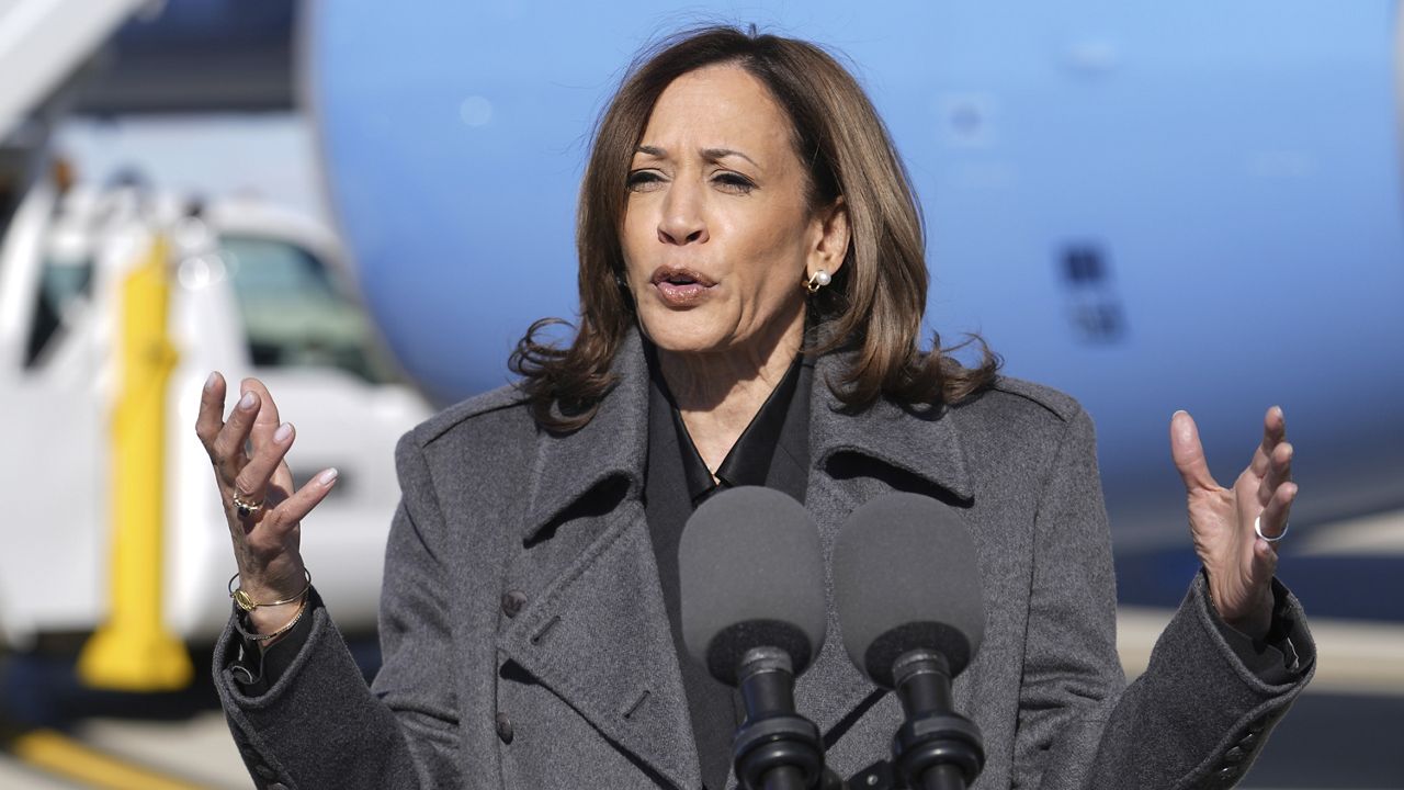 Democratic presidential nominee Vice President Kamala Harris speaks to the media after walking off Air Force Two in Madison, Wis., Friday, Nov. 1, 2024. (AP Photo/Charles Rex Arbogast)