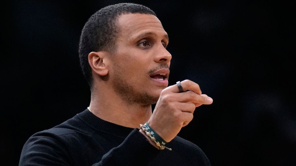 Boston Celtics head coach Joe Mazzulla snaps his fingers while calling to his players during the first half of an NBA basketball game against the LA Clippers, Monday, Nov. 25, 2024, in Boston. (AP Photo/Charles Krupa)