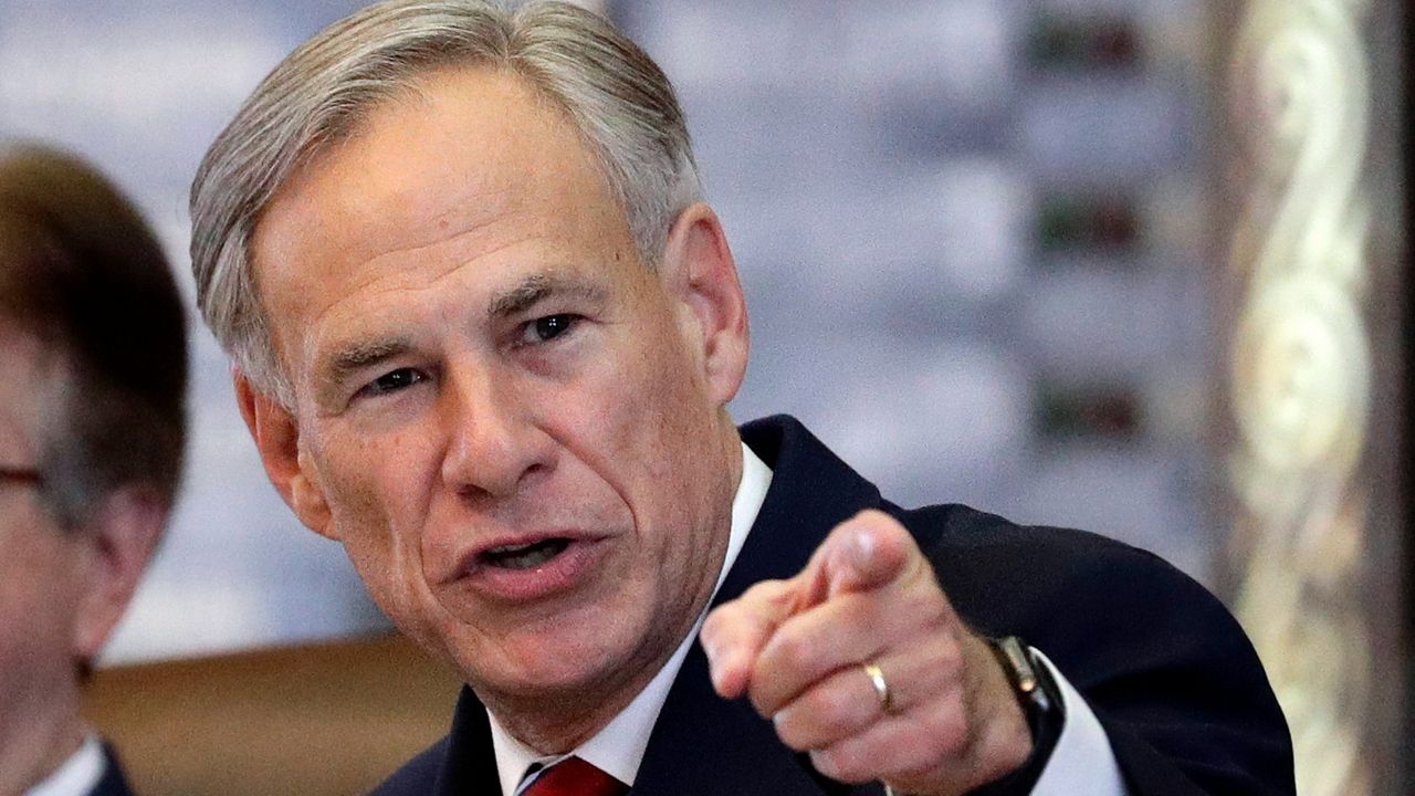 Gov. Greg Abbott signs Senate Bill 8 into law. (AP Images)