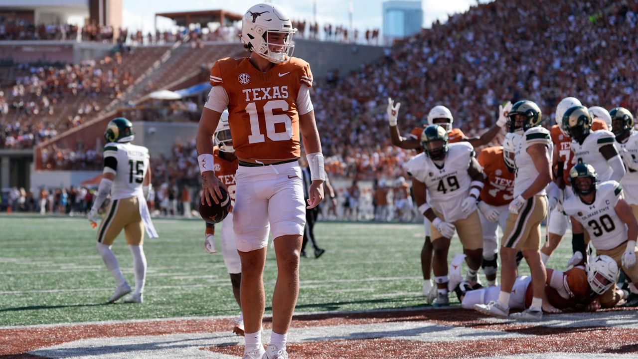 Texas quarterback Arch Manning (16) celebrates after scoring a touchdown against Colorado State during the second half of an NCAA college football game in Austin, Texas, Saturday, Aug. 31, 2024. (AP Photo/Eric Gay)