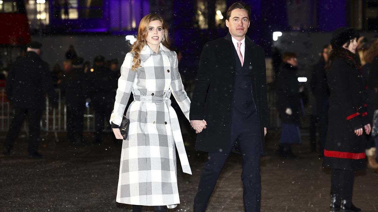 Britain's Britain's Princess Beatrice and Edoardo Mapelli Mozzi attend the Together At Christmas carol service at Westminster Abbey, in London, Dec. 15, 2022. (Henry Nicholls/Pool Photo via AP)