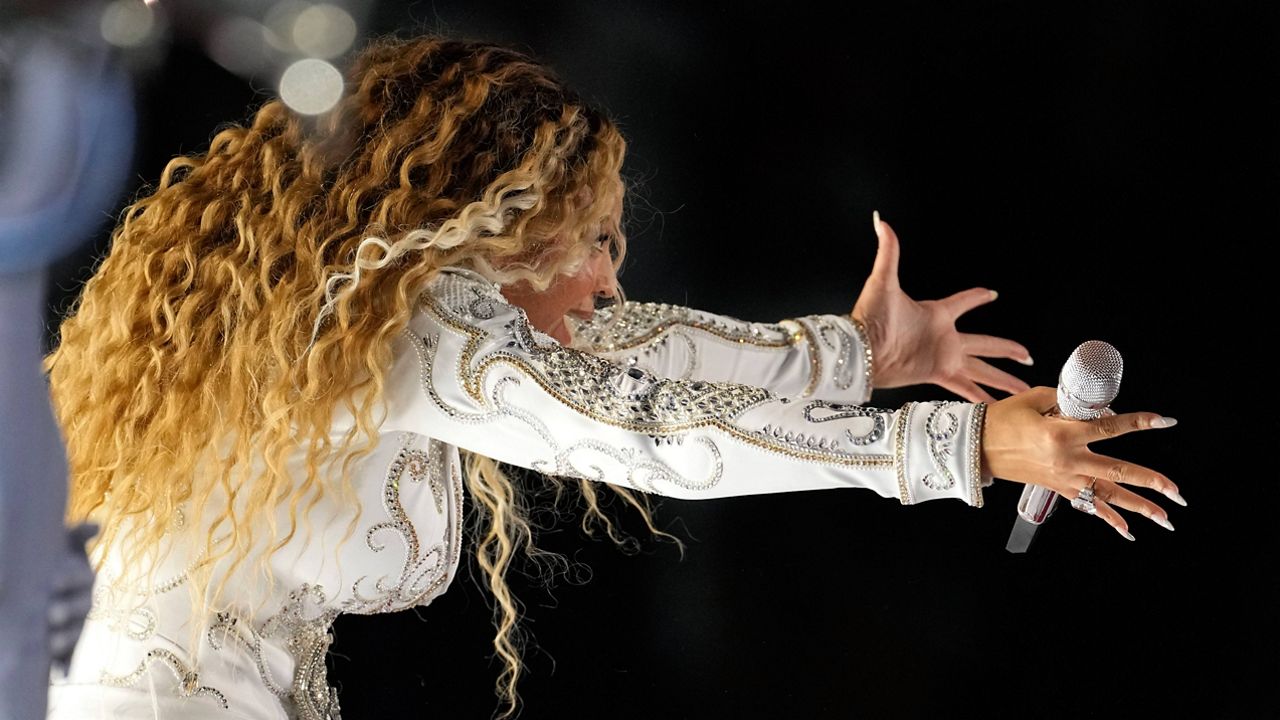 Beyoncé performs during halftime of an NFL football game between the Houston Texans and the Baltimore Ravens, Wednesday, Dec. 25, 2024, in Houston. (AP Photo/David J. Phillip)