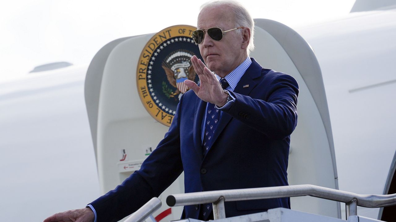 President Joe Biden waves as he arrives on Air Force One at Westchester County Airport in White Plains, N.Y., Monday, June 3, 2024. (AP Photo/Alex Brandon)