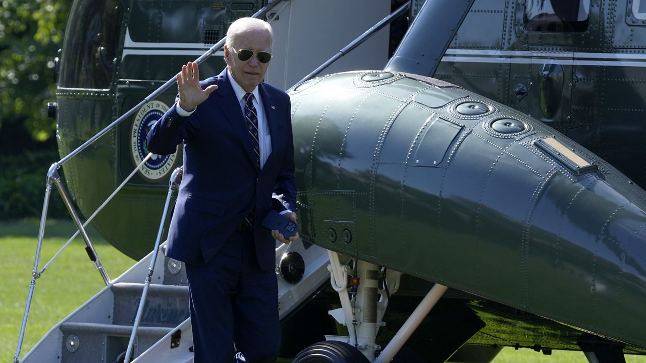 President Joe Biden waves as he walks off of Marine One on the South Lawn of the White House in Washington, Monday, Aug. 12, 2024, after returning from Rehoboth Beach, Del., where he and first lady Jill Biden spent the weekend. (AP Photo/Susan Walsh)