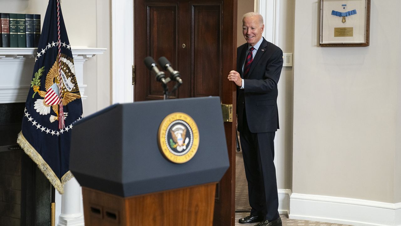 President Joe Biden smiles after being asked about his advice for the next Speaker of the House during an event in the Roosevelt Room of the White House, Wednesday, Oct. 4, 2023, in Washington. (AP Photo/Evan Vucci)